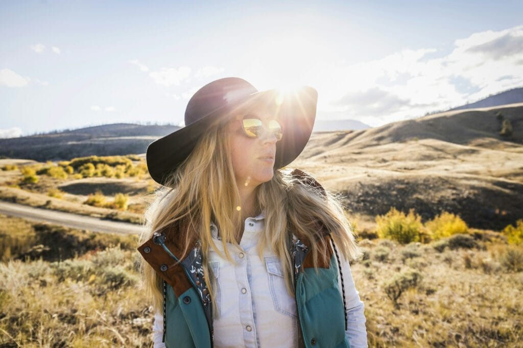 Woman hiking, Trans Canada Highway, near Kamloops, Boston Flats, British Columbia, Canada